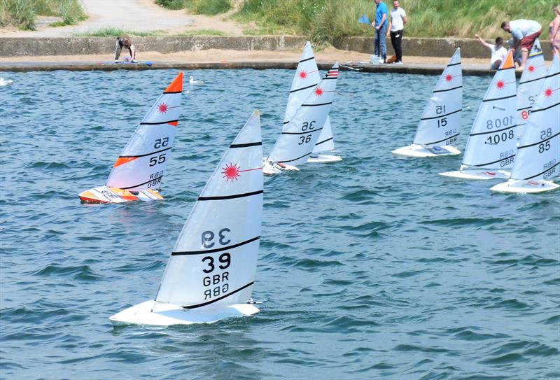 Skip Reaser being chased by Hugo Chandor at the RC Laser Northern Summer Series and TT at Fleetwood photo copyright Rob Wheeler taken at Fleetwood Model Yacht Club and featuring the RC Laser class