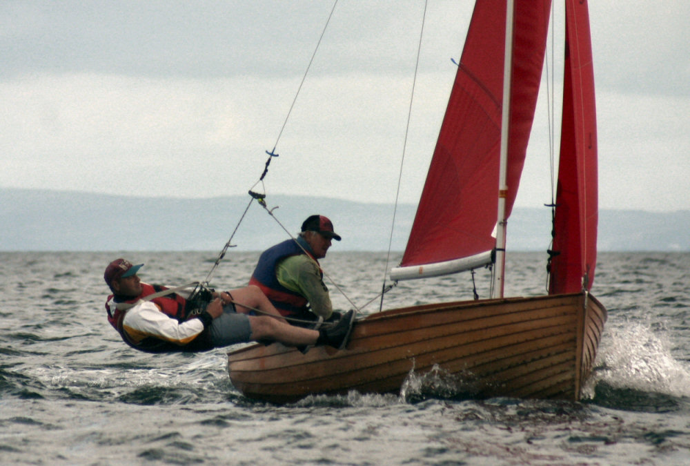 Roger Hocking & Dominic Lozynski win race two during the Redwing nationals start at Tenby photo copyright Janice Bottomley / www.sailaway.me.uk taken at Tenby Sailing Club and featuring the Redwing class