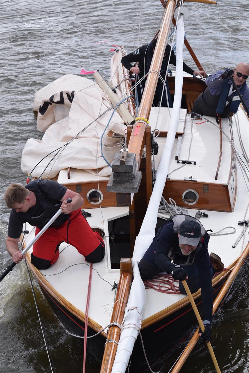 River Cruiser going under Potter Heigham Bridge during the 61st Yachtmaster Insurance Three Rivers Race photo copyright Holly Hancock taken at Horning Sailing Club and featuring the River Cruiser class