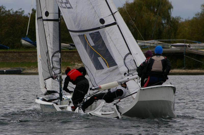 Dave Jessop & Clare Walsh lead Andy & Jill Peters at a windward mark rounding during the RS200 SEAS Open at Island Barn Reservoir photo copyright Jim Champ taken at Island Barn Reservoir Sailing Club and featuring the RS200 class