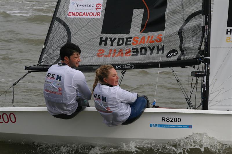 James Peters and Maddy Anderson (RS200) winning the first race of day 2 at the Endeavour Trophy 2019 photo copyright Roger Mant Photography taken at Royal Corinthian Yacht Club, Burnham and featuring the RS200 class