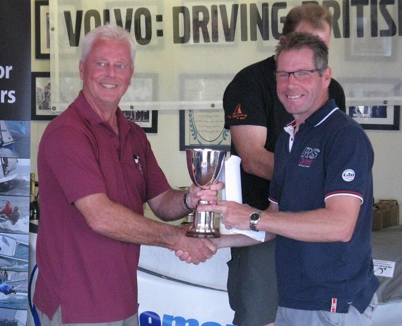 Steve Bolland is presented with the RS300 Nationals trophy photo copyright Exe SC taken at Exe Sailing Club and featuring the RS300 class