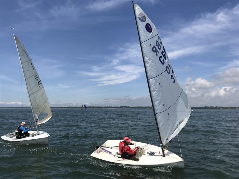 Malcolm Buchanan (Solo) follows Pete Bell (Europe) during Lymington Town SC Early Summer Series Race 3 photo copyright Gareth Griffiths taken at Royal Lymington Yacht Club and featuring the RS400 class