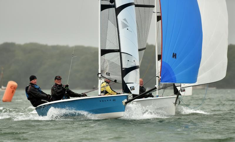 Neck and neck Roger and Nick Elliman (white boat) and Mark Harper and Rob Corfield (blue boat) battle it out in their RS 400s during the Chichester Yacht Club Regatta photo copyright Chris Hatton Photography taken at Chichester Yacht Club and featuring the RS400 class