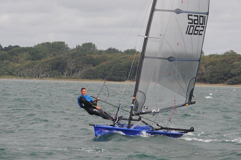 Matt Carter in the Lymington Dinghy Regatta photo copyright Polly Thornton taken at Royal Lymington Yacht Club and featuring the RS700 class