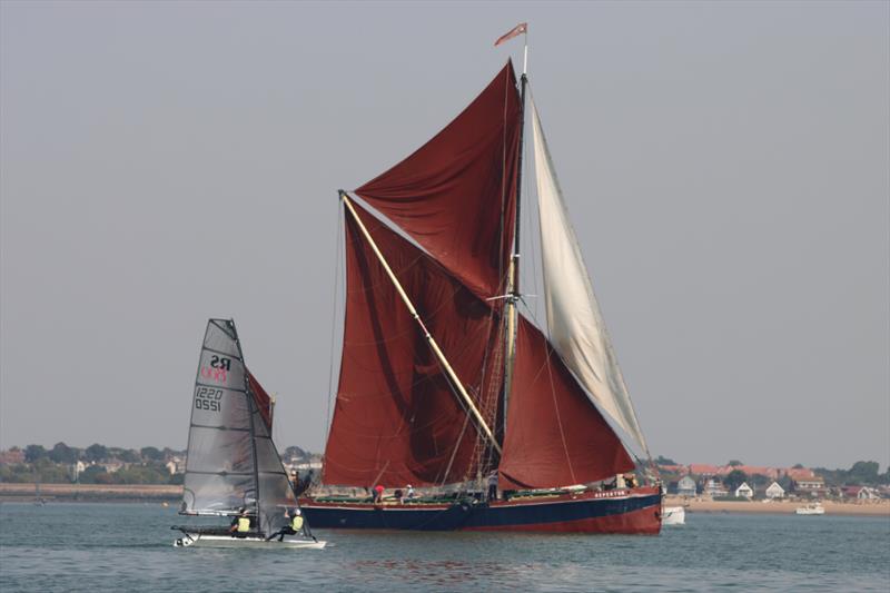 Luke and Emma McEwenon alongside a barge on day 3 of the Noble Marine RS800 Nationals at Brighlingsea photo copyright William Stacey taken at Brightlingsea Sailing Club and featuring the RS800 class