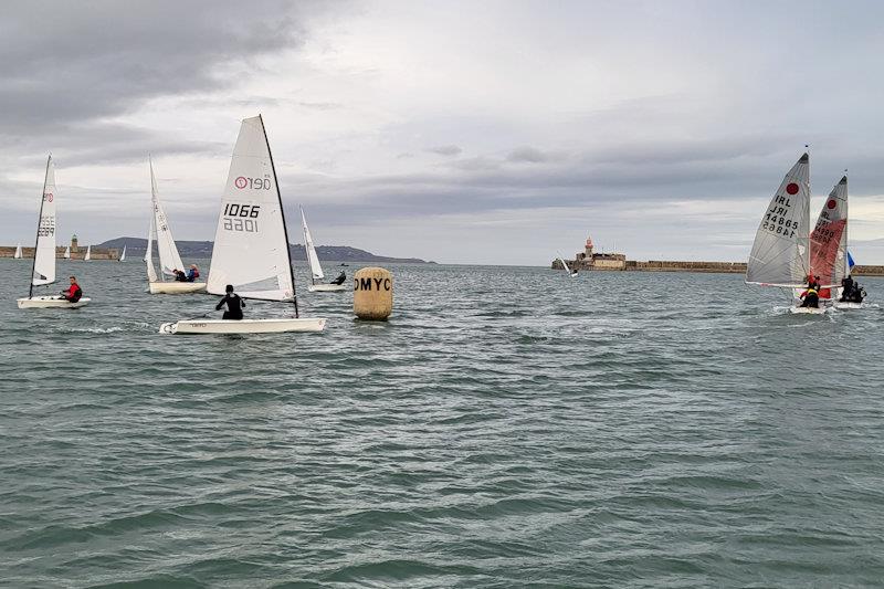 Thomas Chaix (Aero 1066) leads the chasing group behind the Fireballs - Viking Marine DMYC Frostbite Series 1 final day photo copyright Ian Cutliffe taken at Dun Laoghaire Motor Yacht Club and featuring the RS Aero 7 class