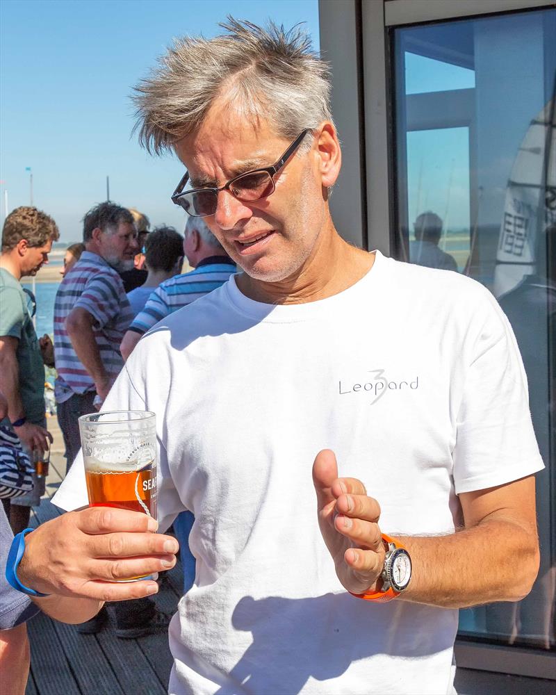 Russell Peters discusses tactics after racing at the HISC Whitsun Regatta photo copyright Alasdair McLeod taken at Hayling Island Sailing Club and featuring the RS Elite class