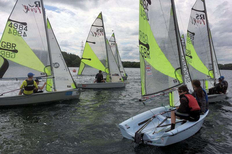 Start line action from the RS Feva open meeting at Burghfield photo copyright David Baddeley taken at Burghfield Sailing Club and featuring the RS Feva class