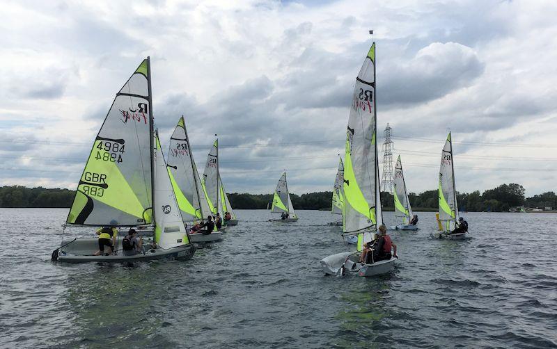 Start line action from the RS Feva open meeting at Burghfield photo copyright David Baddeley taken at Burghfield Sailing Club and featuring the RS Feva class