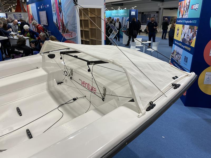 Cover fitted over tillers when lever steering is used (with forward-facing seats) to stop mainsheet entanglement photo copyright Magnus Smith taken at RYA Dinghy Show and featuring the RS Venture class