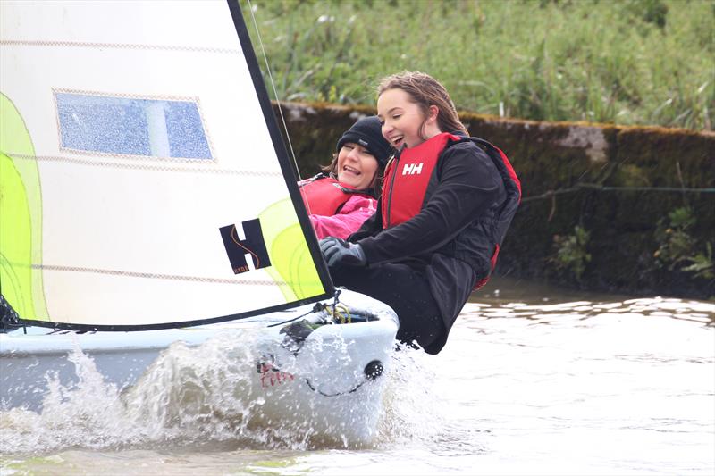 2018 ilovesailing calendar : Sunny smiles by Karen Langston photo copyright Karen Langston taken at Beccles Amateur Sailing Club and featuring the  class