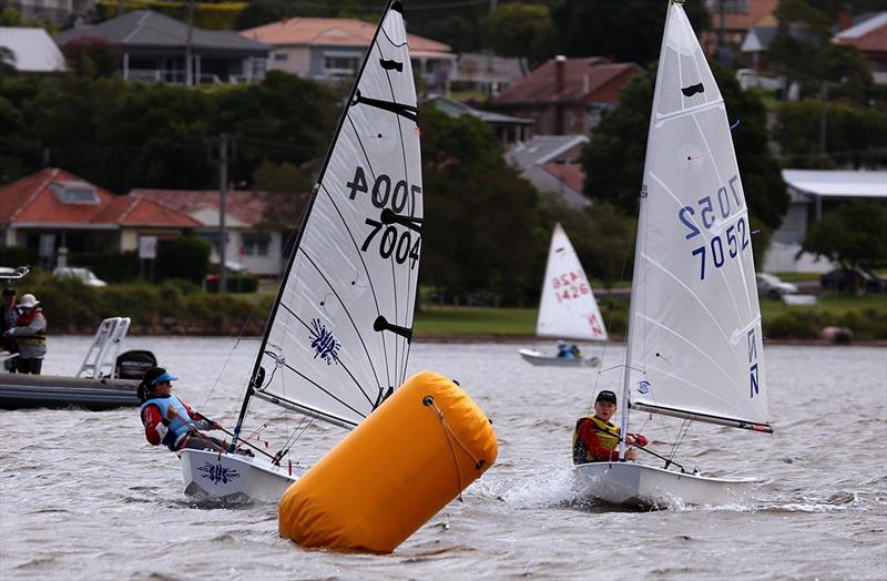 Bailey Mayne (Slippery Little Sucker) racing Leo Pirret (Easy Tiger) - 2021-22 Sabot NSW State Championship photo copyright Sam Gong taken at Teralba Amateur Sailing Club and featuring the Sabot class
