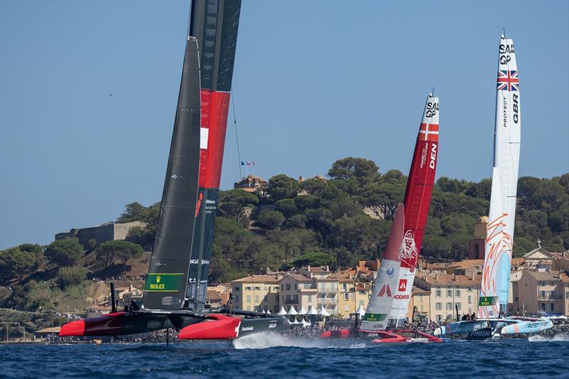 Switzerland SailGP Team, Denmark SailGP Team presented by ROCKWOOL and Great Britain SailGP Team sail past the old town of Saint Tropez on Race Day 2 of the Range Rover France Sail Grand Prix in Saint Tropez, France photo copyright Felix Diemer for SailGP taken at  and featuring the  class