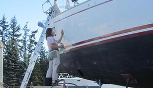 Polishing the topsides, and we all have to face it - Jeanne Socrates, oldest ever non-stop female solo circumnavigator, at work on Nereida photo copyright  SW taken at  and featuring the  class