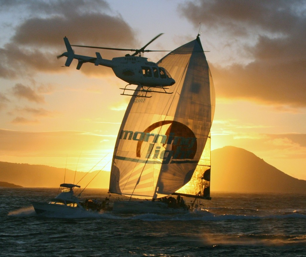 Hawaiian sunrise chases Morning Light to the finish - Transpac 2007 - photo © Rich Roberts