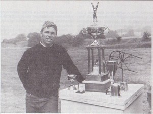 Clive Roberts 1973 World OK Dinghy Champion with his trophies at Falmouth, UK. His win had a huge impact on New Zealand sailing. photo copyright DB Yachting taken at  and featuring the  class