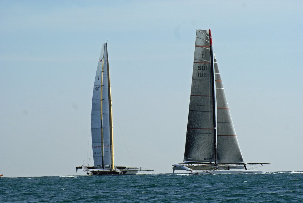 Alinghi 5 and USA-17 at a critical moment on Leg 1 of Race 1, 2010 America's Cup - photo © Richard Gladwell <a target=