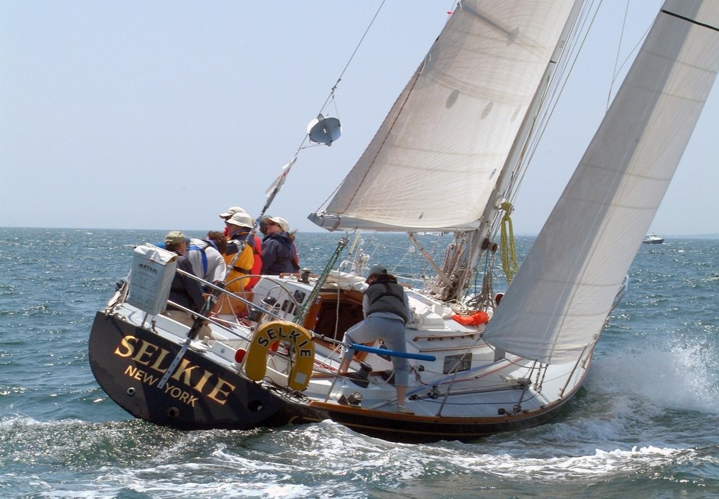 Sheila McCurdy's family boat Selkie powers upwind at the start of the 2008 Newport Bermuda Races. Selkie will see her 10th Newport Bermuda Race in 2012. McCurdy has been aboard on all the races, 3 as navigator for her father Jim McCurdy, the boat's designer and 6 as both skipper and navigator. In 2008 Selkie finishes 2nd in class and 2nd in the St. David's Lighthouse Division. - photo © Talbot Wilson