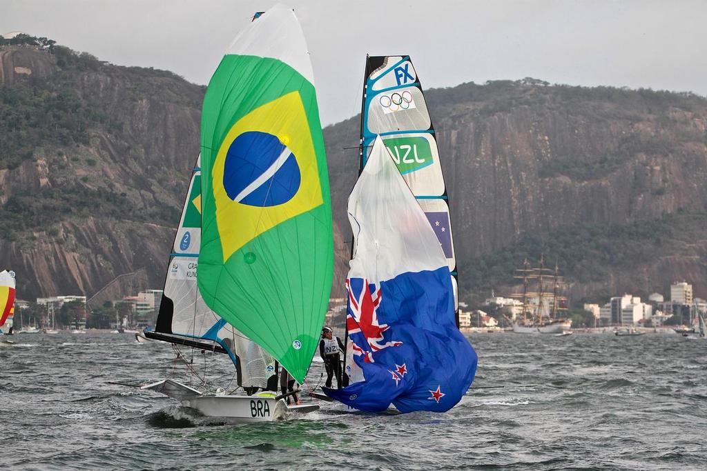 Martina Grael and Kahena Kunze (BRA) sneak through the New Zealand crew to take the Gold medal in the 49erFX - Rio Olympics - photo © Richard Gladwell www.photosport.co.nz