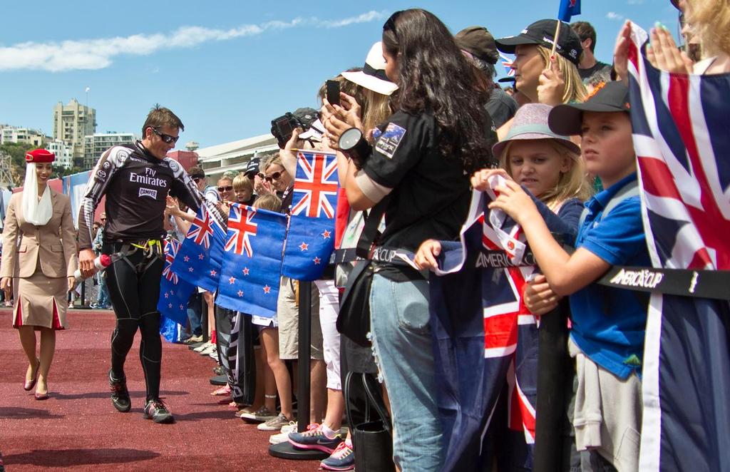 Emirates Team New Zealand skipper, Dean Barker, shakes hands with fans during the dock out show, on day one of the 2013 Louis Vuitton Cup final between Emirates Team New Zealand and Luna Rossa. - photo © Bob Grieser/Outside Images www.outsideimages.com