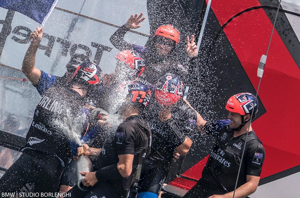 Emirates Team New Zealand crew turn on the champagne fire-hose after winning the 35th America's Cup - photo ©  BMW | Studio Borlenghi