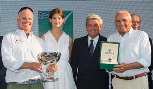 Hap Fauth (right) receives a Rolex Timepiece and the Maxi 72 World Championship Trophy from Riccardo Marini of Rolex and Princess Salwa Aga Khan photo copyright  Rolex / Carlo Borlenghi http://www.carloborlenghi.net taken at  and featuring the  class