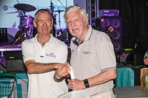 John Williams (right) was awarded the Boss Hog Trophy by Neil Newton – Airlie Beach Race Week photo copyright  Vampp Photography taken at  and featuring the  class