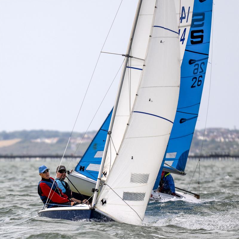 Sail Number 14 (Harrison Floyd & Gary Levy) followed by sail number 26 (Mark Robinson & Janet Wilsmer) on Sunday during the Sandhopper Nationals at Thorpe Bay photo copyright David Maynard / www.alleycatphotographer.com taken at Thorpe Bay Yacht Club and featuring the Sandhopper class