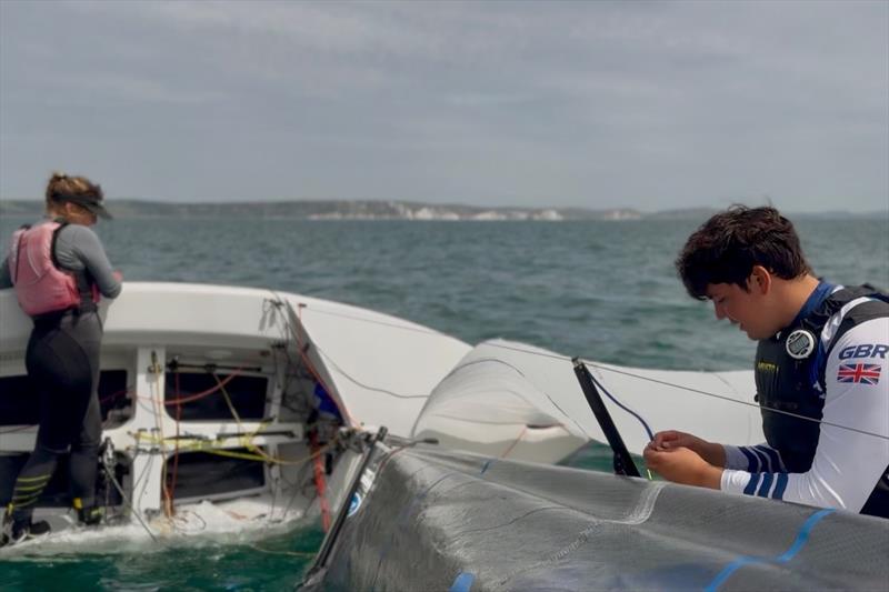 Essential boat tuning afloat - RYA Scorpion Coaching weekend at WPNSA photo copyright Nick Lightbody taken at Weymouth & Portland National Sailing Academy and featuring the Scorpion class