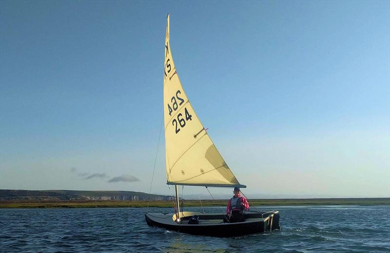 Keyhaven Scow sailing with the new rudder stock photo copyright Mark Jardine taken at Keyhaven Yacht Club and featuring the  class