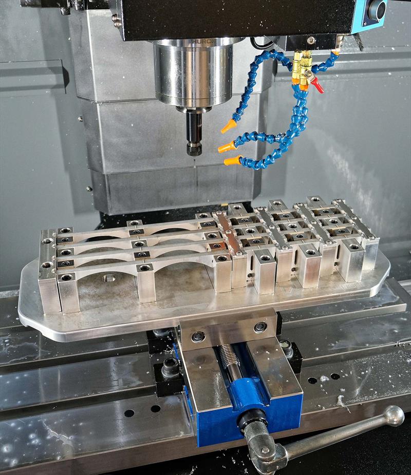 A kit of parts needed for the assembly of a Sea Sure shock mitigation product is nested onto a single plate for machining in one hit on the Hurco VM10i, leading to efficient production through fewer set-ups and tool changes photo copyright Sea Sure taken at  and featuring the  class