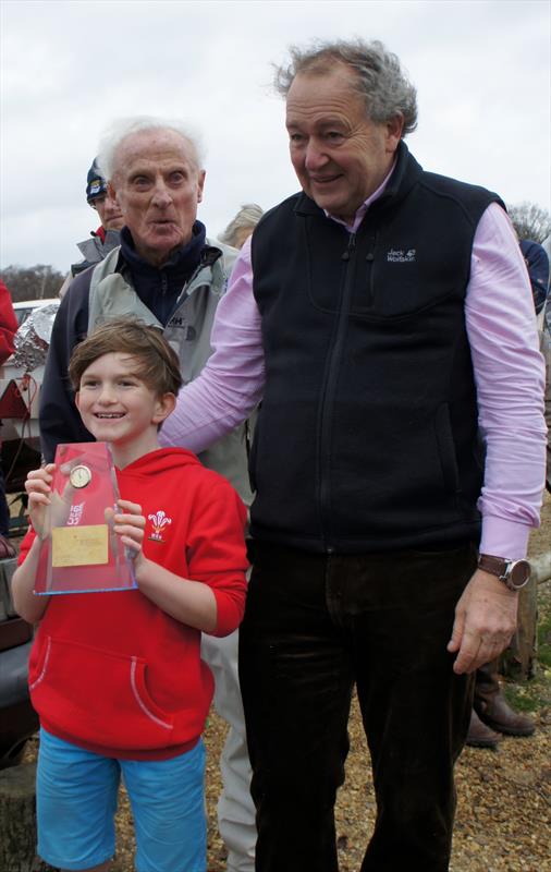 Andrew Hurst presents multihull winner Finn Gabriel with his trophy in the 2015 Setley Cup and Seahorse Trophy photo copyright Ann Brunskill taken at Royal Lymington Yacht Club and featuring the Setley Cup class