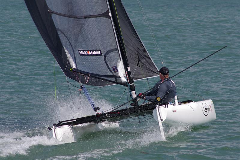 Paul Tanner downwind in a gust photo copyright Shadow class taken at Grafham Water Sailing Club and featuring the Shadow class