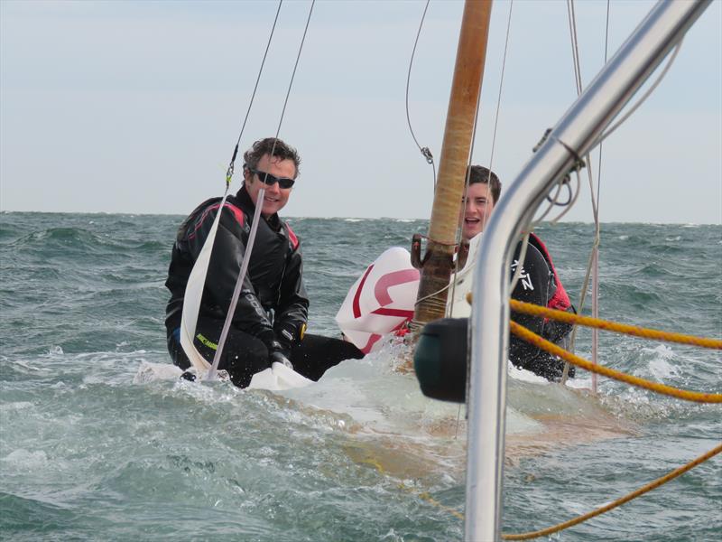 Eventual Winners GBR127 post capsize tow home at the British Sharpie Championship photo copyright James Case taken at Wells Sailing Club and featuring the Sharpie class