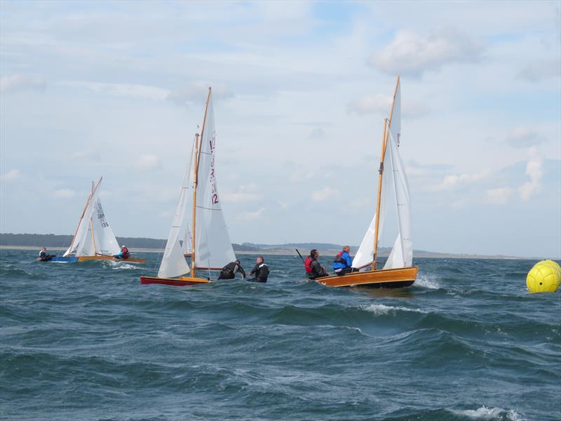 Windward mark rounding during the British Sharpie Championship photo copyright James Case taken at Wells Sailing Club and featuring the Sharpie class