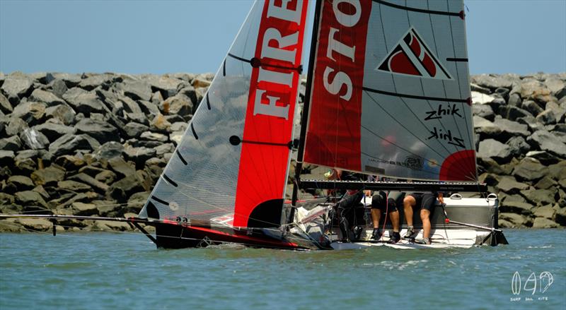 Fire Stopping behind the breakwall and heading out photo copyright Mitchell Pearson / SurfSailKite taken at Darling Point Sailing Squadron and featuring the 16ft Skiff class