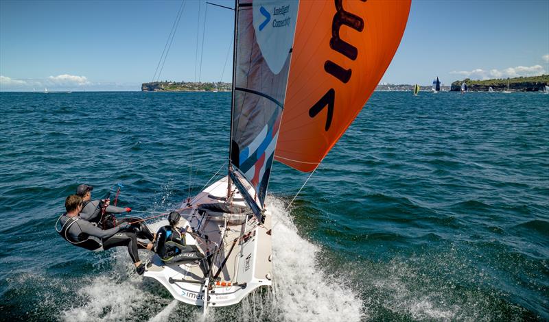 Sarah Lee in imei chasing down Employment Hero in Manly 16s Club Championship Heat 10 photo copyright SailMedia taken at Manly 16ft Skiff Sailing Club and featuring the 16ft Skiff class