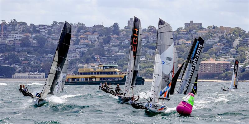 Top mark action photo copyright SailMedia taken at Manly 16ft Skiff Sailing Club and featuring the 16ft Skiff class
