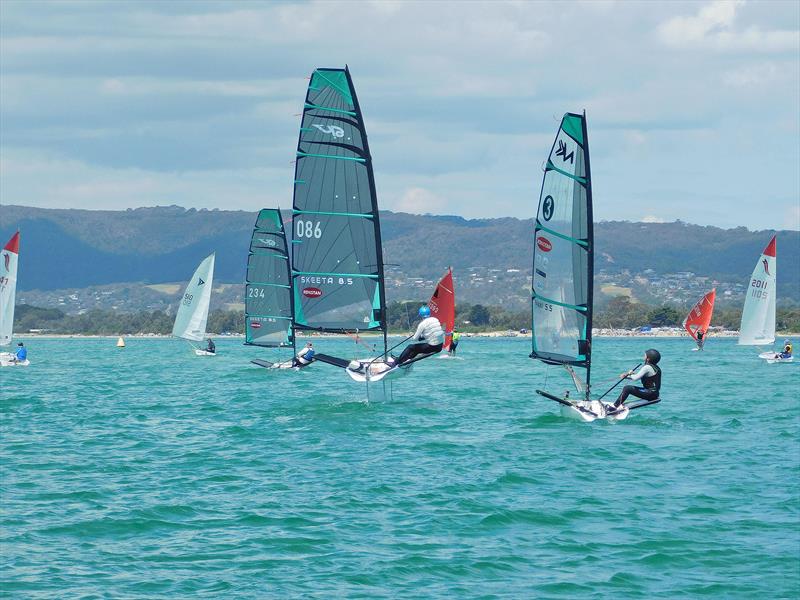 David French on the Skeeta with 13 year old Acklin Stent in hot pursuit on the Nikki photo copyright Capel Sound Invitational taken at Rye Yacht Club and featuring the SKEETA class