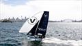 An iconic sight, an 18, the bridge, opera house and the city © SailMedia