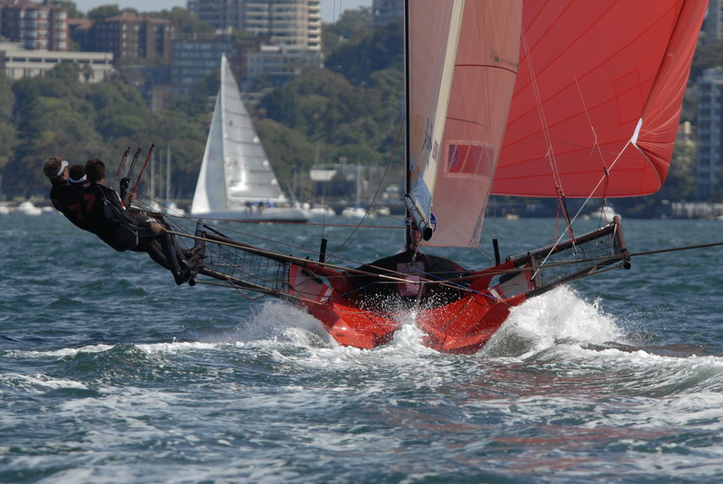 The young Gotta Love It 7 crew of Seve Jarvin, Sam Newton and Robert Bell win the JJ Giltinan Championship on Sydney Harbour photo copyright Christophe Favreau / www.christophefavreau.book.fr taken at Sydney Flying Squadron and featuring the 18ft Skiff class