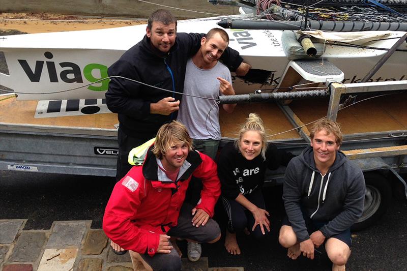 The two crews pose alongside the hull after Sydney City Marine hit Viagogo during the 3-Buoys Challenge Series race 5 start - photo © Frank Quealey