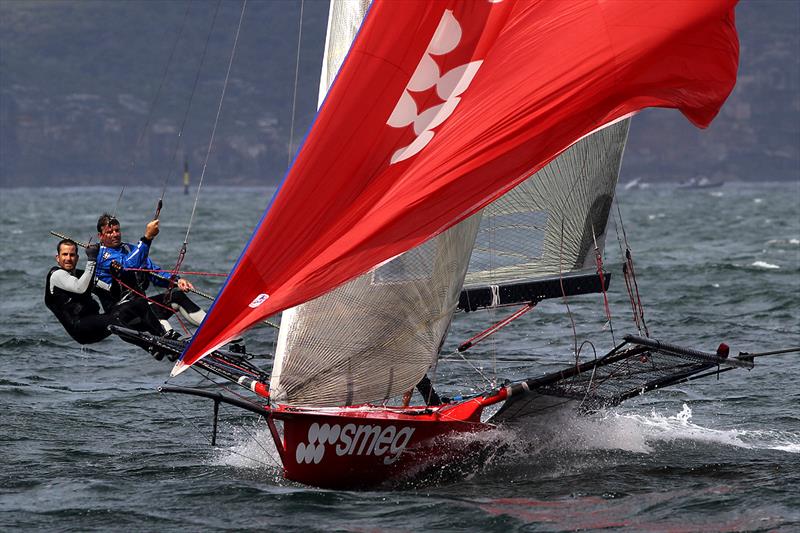 Pressure on the faces of Smeg's David Witt and Tom Clout in race 4 of the 18ft Skiff Club Championship - photo © Frank Quealey