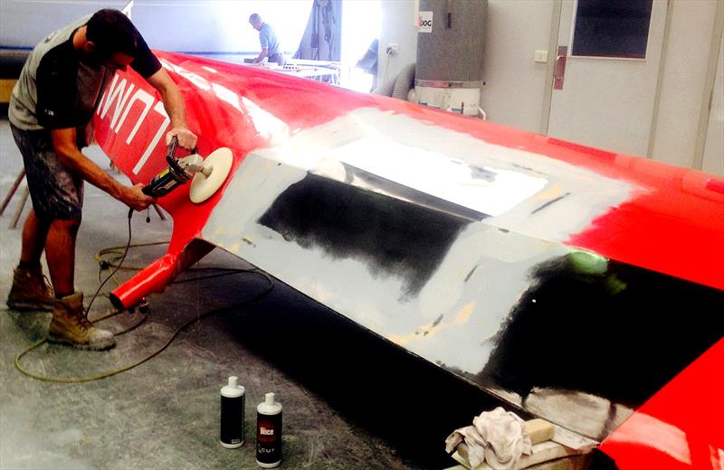 The finishing touches to the repair on the Lumix 18ft Skiff hull photo copyright Frank Quealey taken at  and featuring the 18ft Skiff class