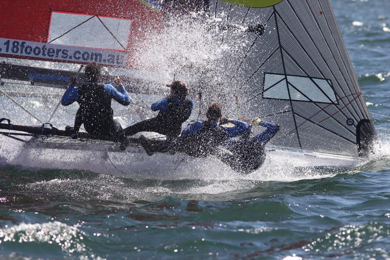 Thurlows Compensation Lawyers crew power through the waves on the first beat during the 18ft Skiff Queen of the Harbour photo copyright Frank Quealey taken at Australian 18 Footers League and featuring the 18ft Skiff class