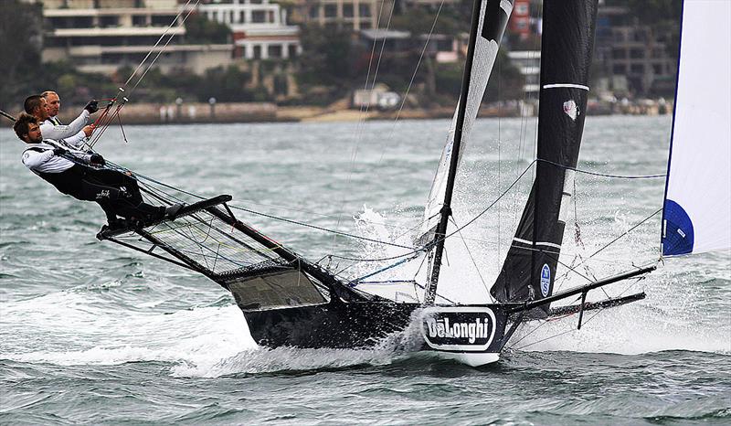 De'Longhi crew ride the squall during race 5 of the 18ft Skiff Spring Championship in Sydney photo copyright Frank Quealey taken at Australian 18 Footers League and featuring the 18ft Skiff class