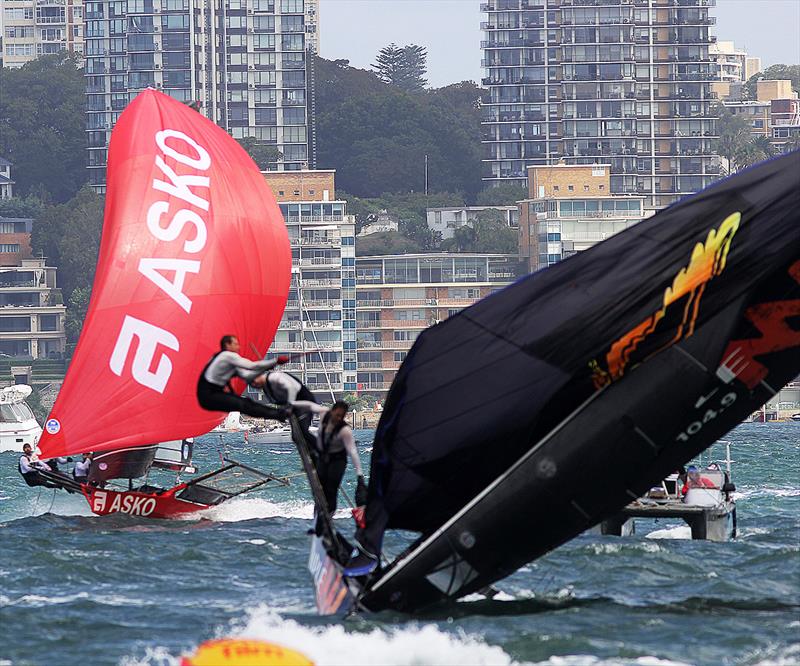 Triple M capsizes as Asko Appliances roars home under spinnaker on day 3 of the 18ft Skiff Australian Championship 2018 photo copyright Frank Quealey taken at Australian 18 Footers League and featuring the 18ft Skiff class