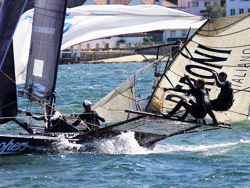 Rag and Famish Hotel passes Peroni during the 18ft Skiff Queen of the Harbour photo copyright Frank Quealey taken at Australian 18 Footers League and featuring the 18ft Skiff class