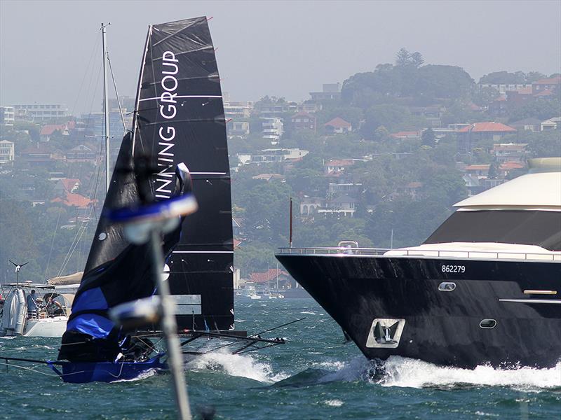 Series leader Winning Group battles Sydney Harbour traffic in the 18ft Skiff Australian Championship photo copyright Frank Quealey taken at Australian 18 Footers League and featuring the 18ft Skiff class
